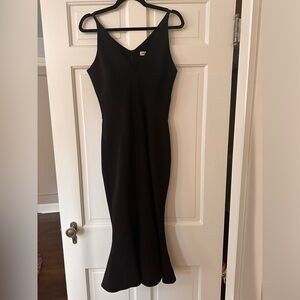 Black trumpet cut strappy dress. Size M